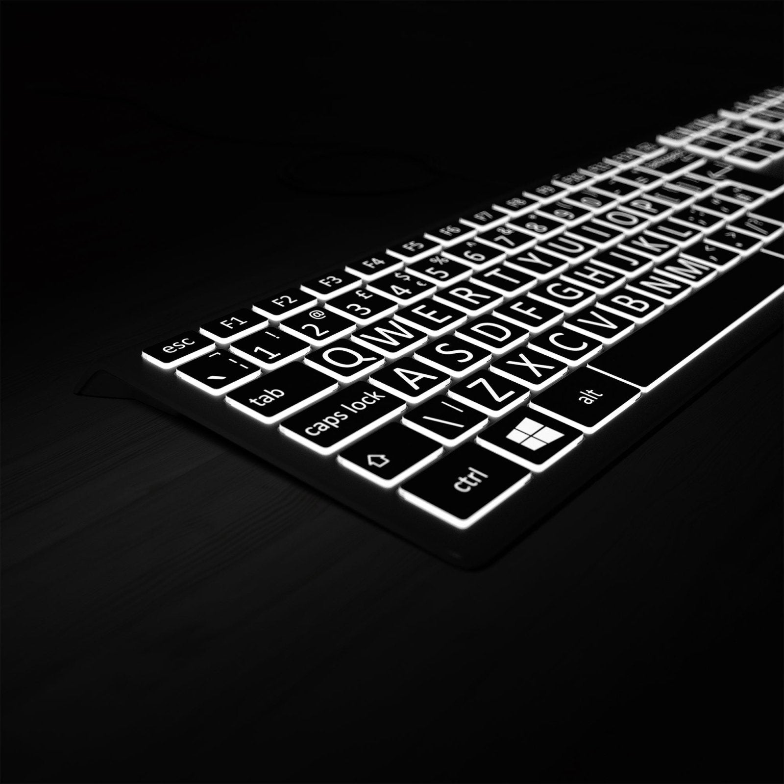 Backlit Feature Illuminating the Large Print Keys on Black and white Keyboard